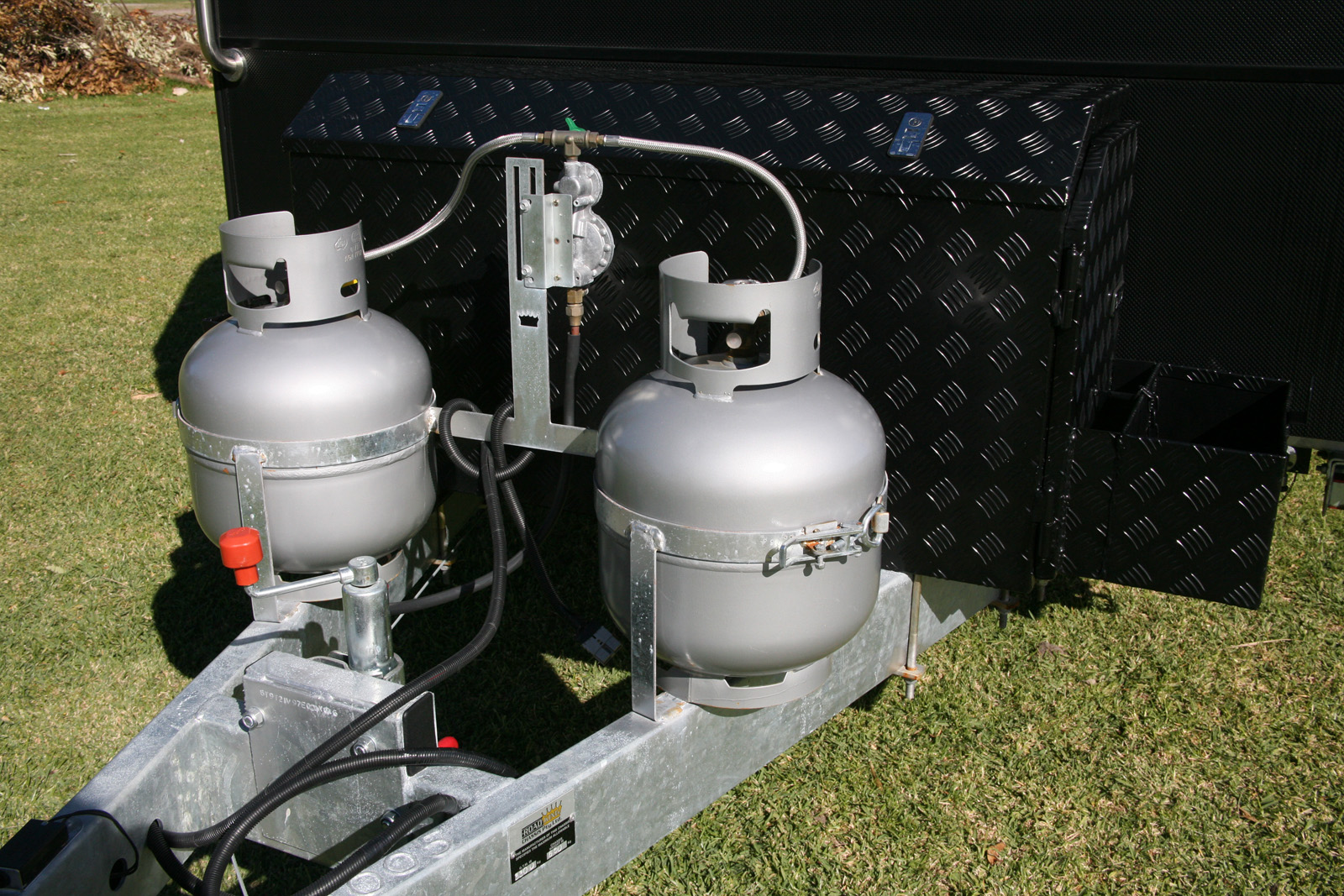 Caravan LPG gas regulator installed on A-frame