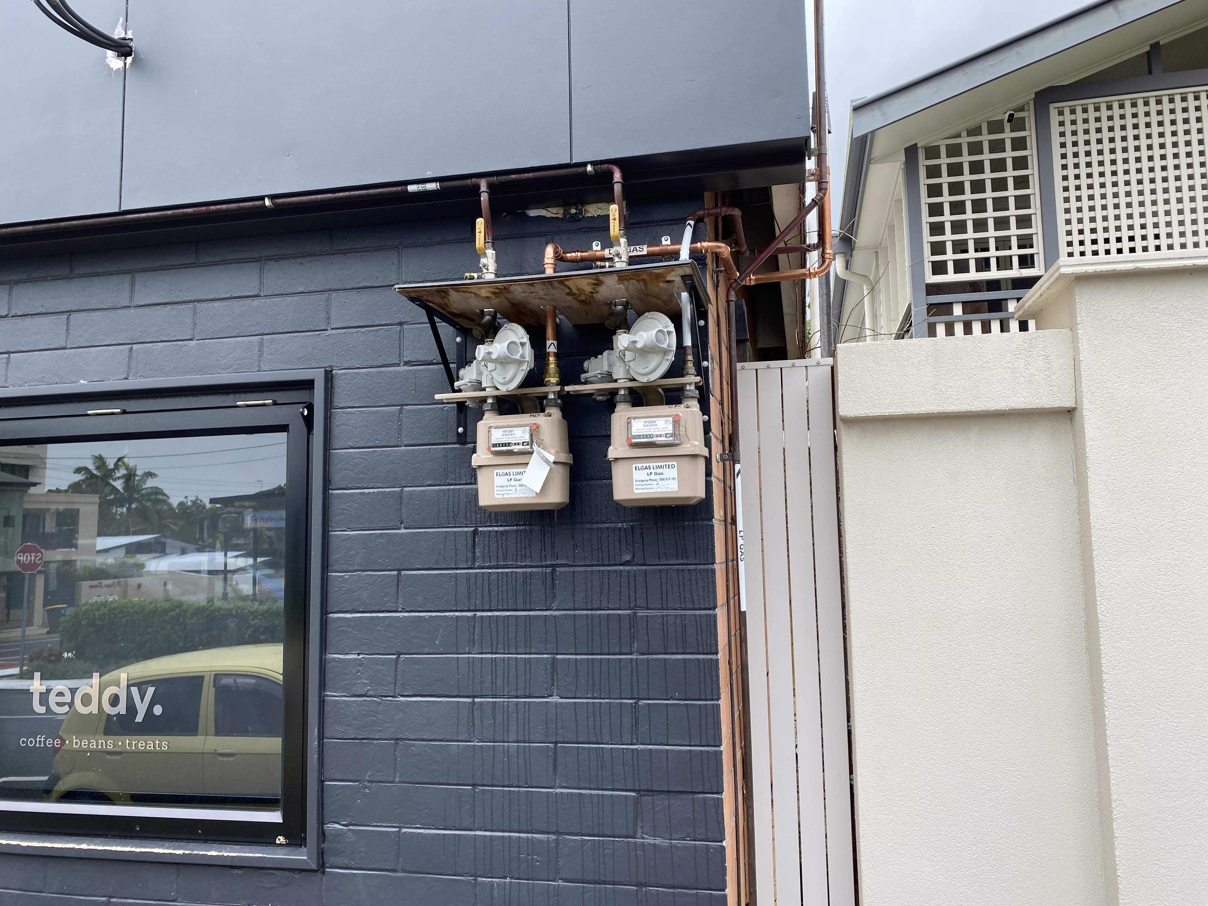 Two gas meters feeding dual commercial buildings